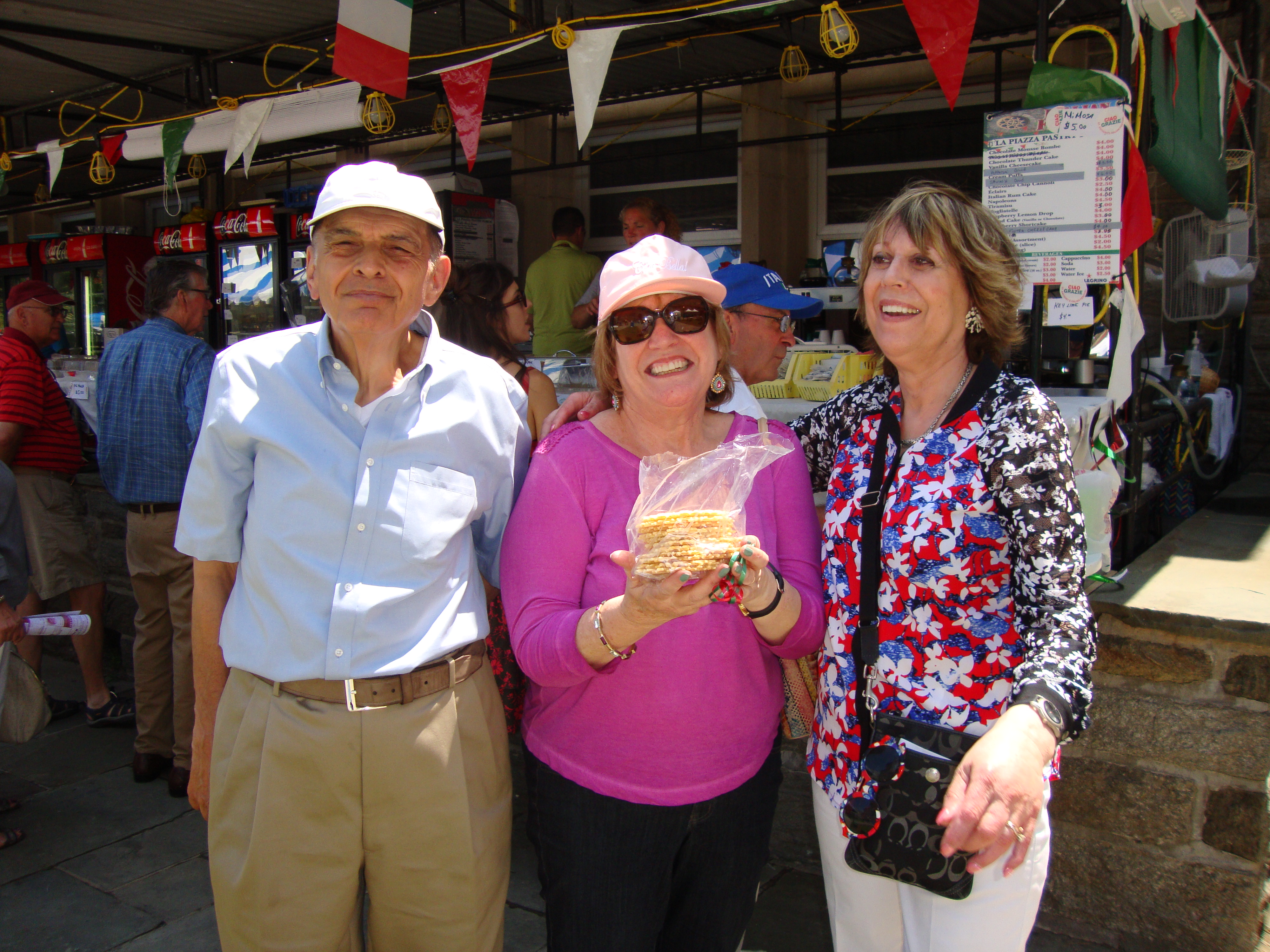 Enjoying treats at St Anthony Festival