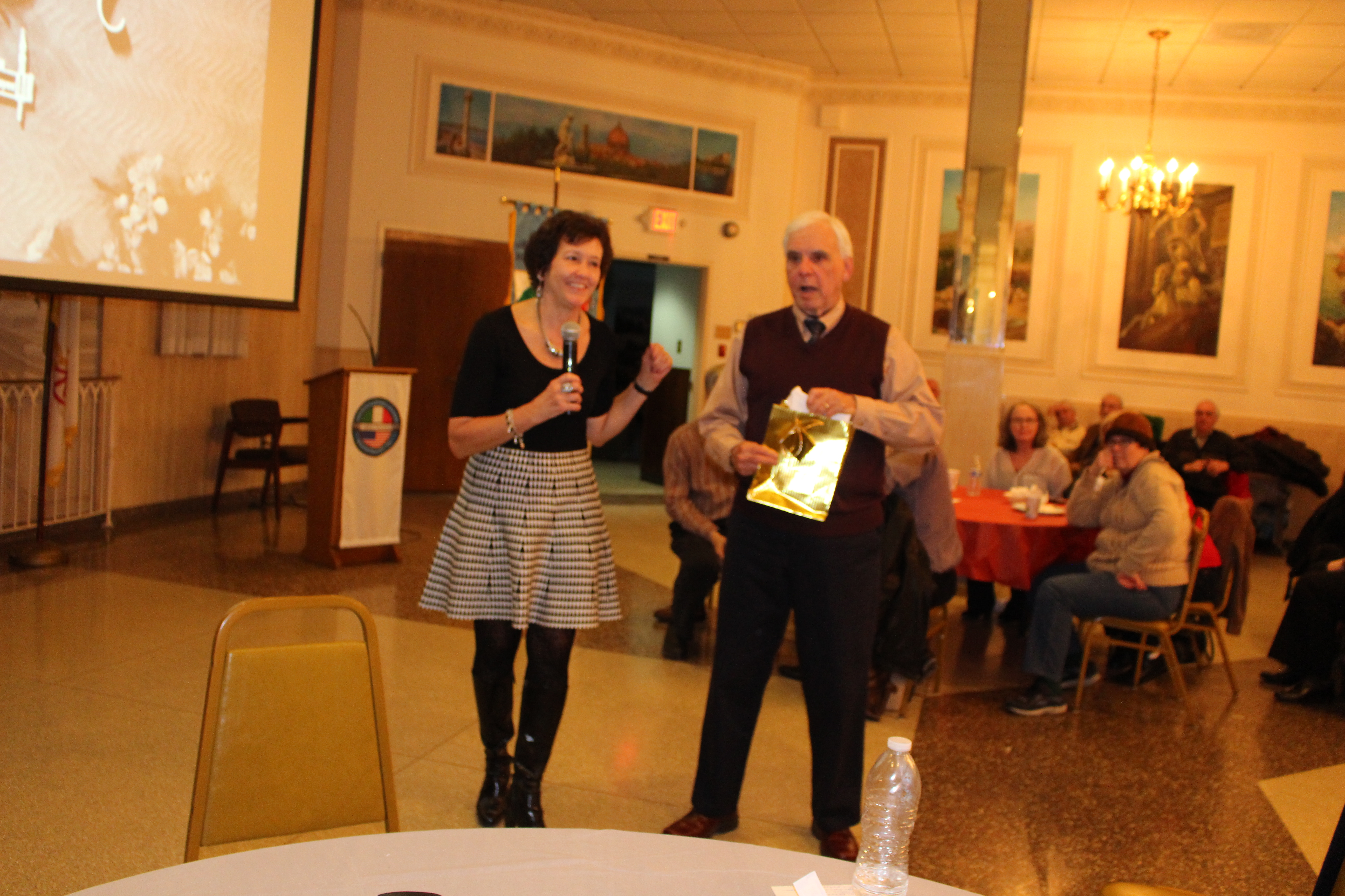 AMHS Pres Maria D'Andrea presents gift to Dr. Centini, Jan 31, 2016 meeting